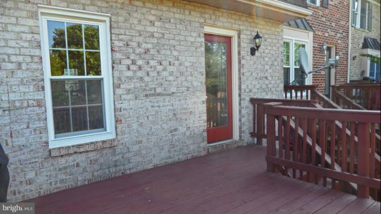 8007 Hollow Reed Court Frederick, MD 21701 - Photo 22 of 23 Exterior(Rear) deck entrance from living room