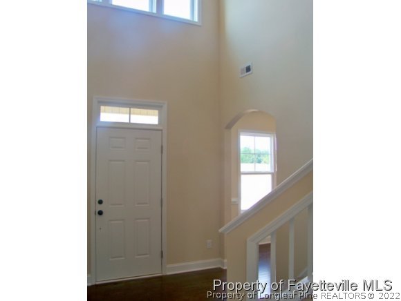 114 Sandy Springs Road Aberdeen, NC 28315 - Photo 8 of 18 a view of a hallway with windows