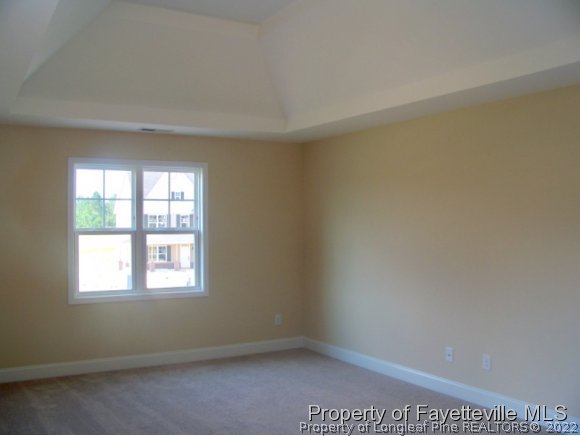 114 Sandy Springs Road Aberdeen, NC 28315 - Photo 9 of 18 an empty room with a window