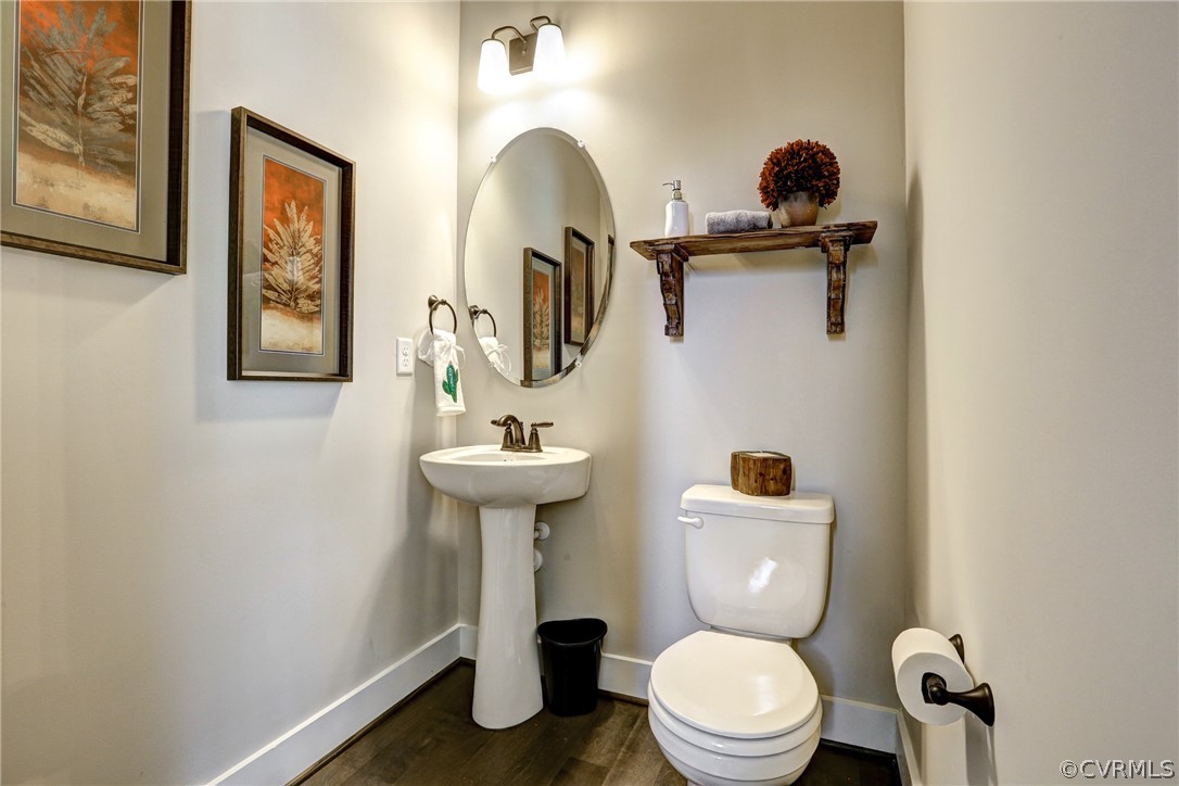 4913 Appelman Ridge Chesterfield, VA 23832 - Photo 11 of 21 a bathroom with a toilet sink and mirror