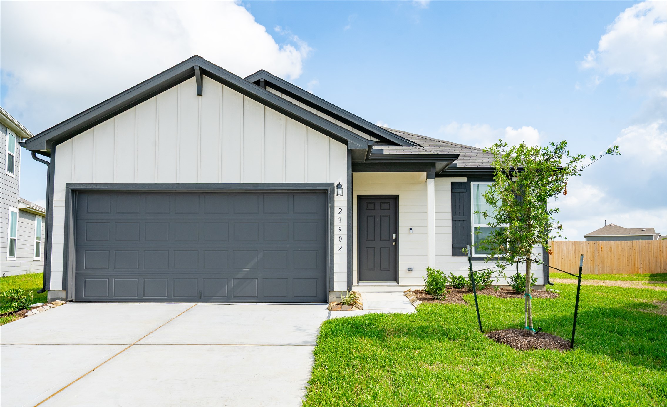 a front view of house with a yard