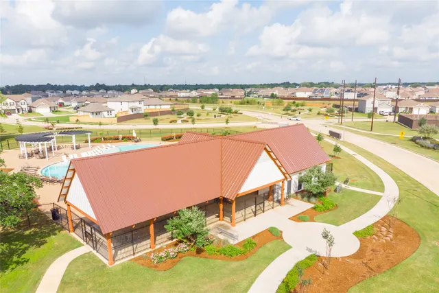 a view of a swimming pool with a patio