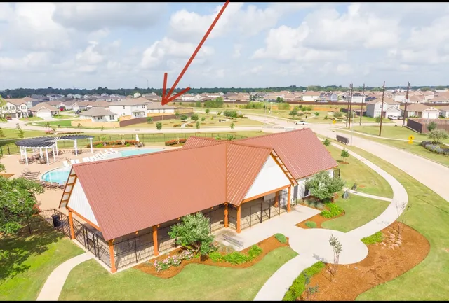 an aerial view of a swimming pool