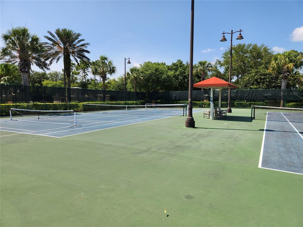 1144 Bellamare Trail Trinity, FL 34655 - Photo 24 of 32 a swimming pool with outdoor seating and yard