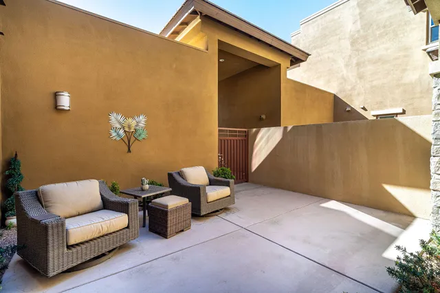 a swimming pool with outdoor seating yard and barbeque oven