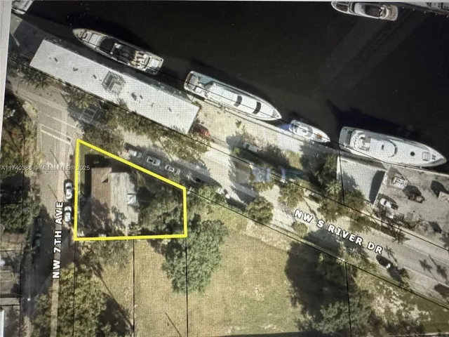 a blue sign that is on the side of a building