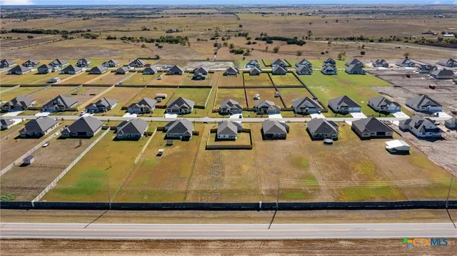 a view of swimming pool with outdoor seating