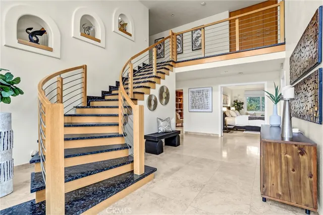 a bathroom with a tub a toilet and a shower