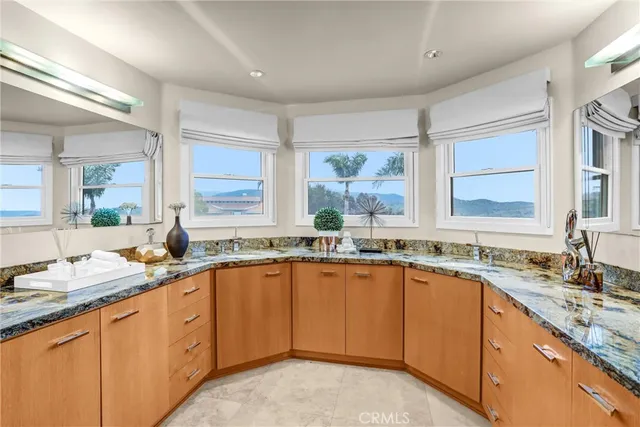 a view of a swimming pool with a table and chairs