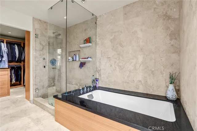 a view of a chairs and table in the patio