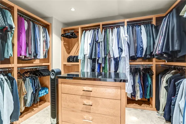 a view of a swimming pool and lounge chairs