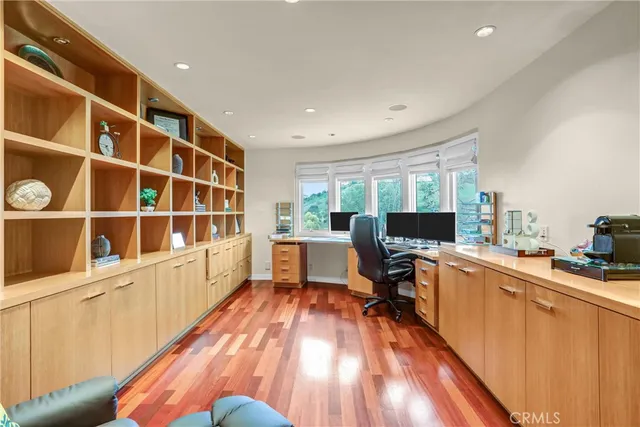 a view of a garden with a tree in a yard