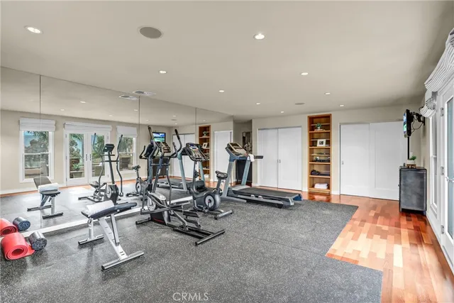 a view of an outdoor dining space with a table and chairs