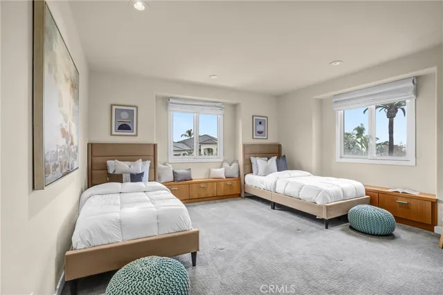 a view of a garden with swimming pool and lake view