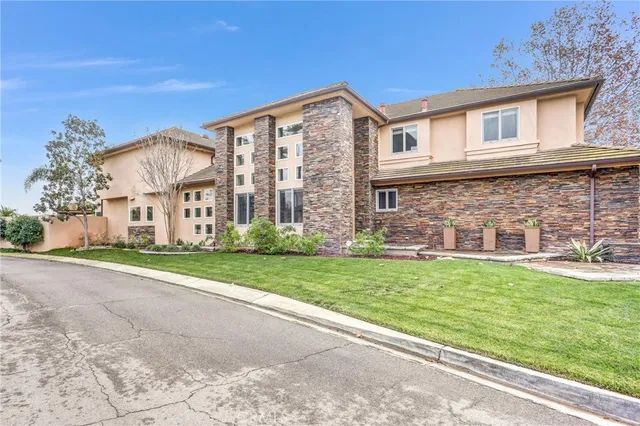 a view of a workspace with furniture and a bookshelf