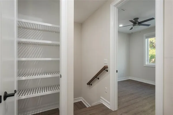 a view of a room with rack on the wall