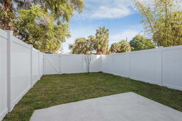 a room with cabinets and wooden floor
