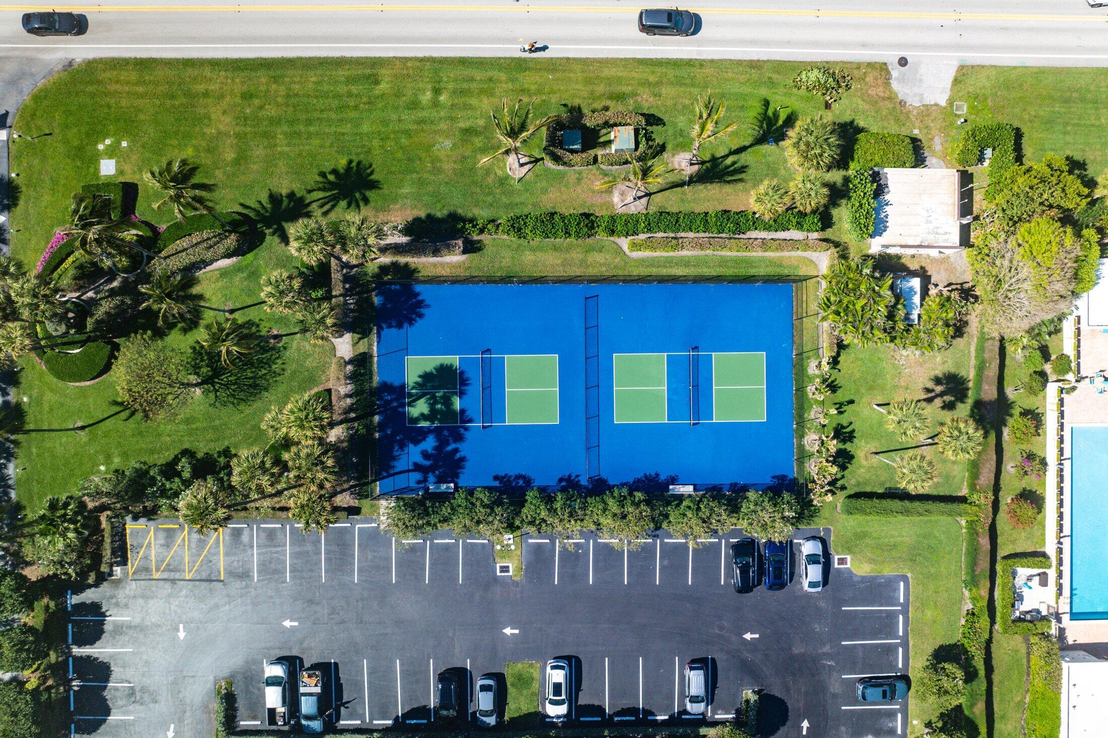 3400 South Ocean Boulevard, Unit 7AII Palm Beach, FL 33480 - Photo 26 of 33 an aerial view of a house with a garden