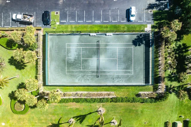 a view of a building with a big yard