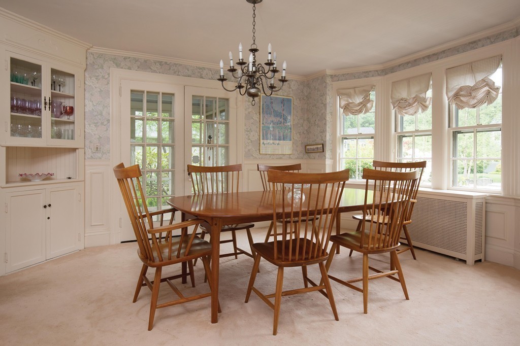 21 Pilgrim Road Newton, MA 02468 - Photo 4 of 10 a view of a dining room with furniture window and outside view
