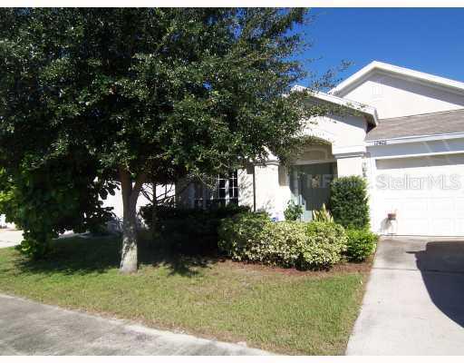 12426 Tree Pointe Court Riverview, FL 33578 - Photo 1 of 1 a front view of a house with garden