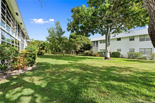 a view of a house with a big yard