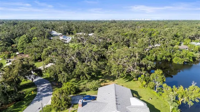 a view of a lake with a building in the background
