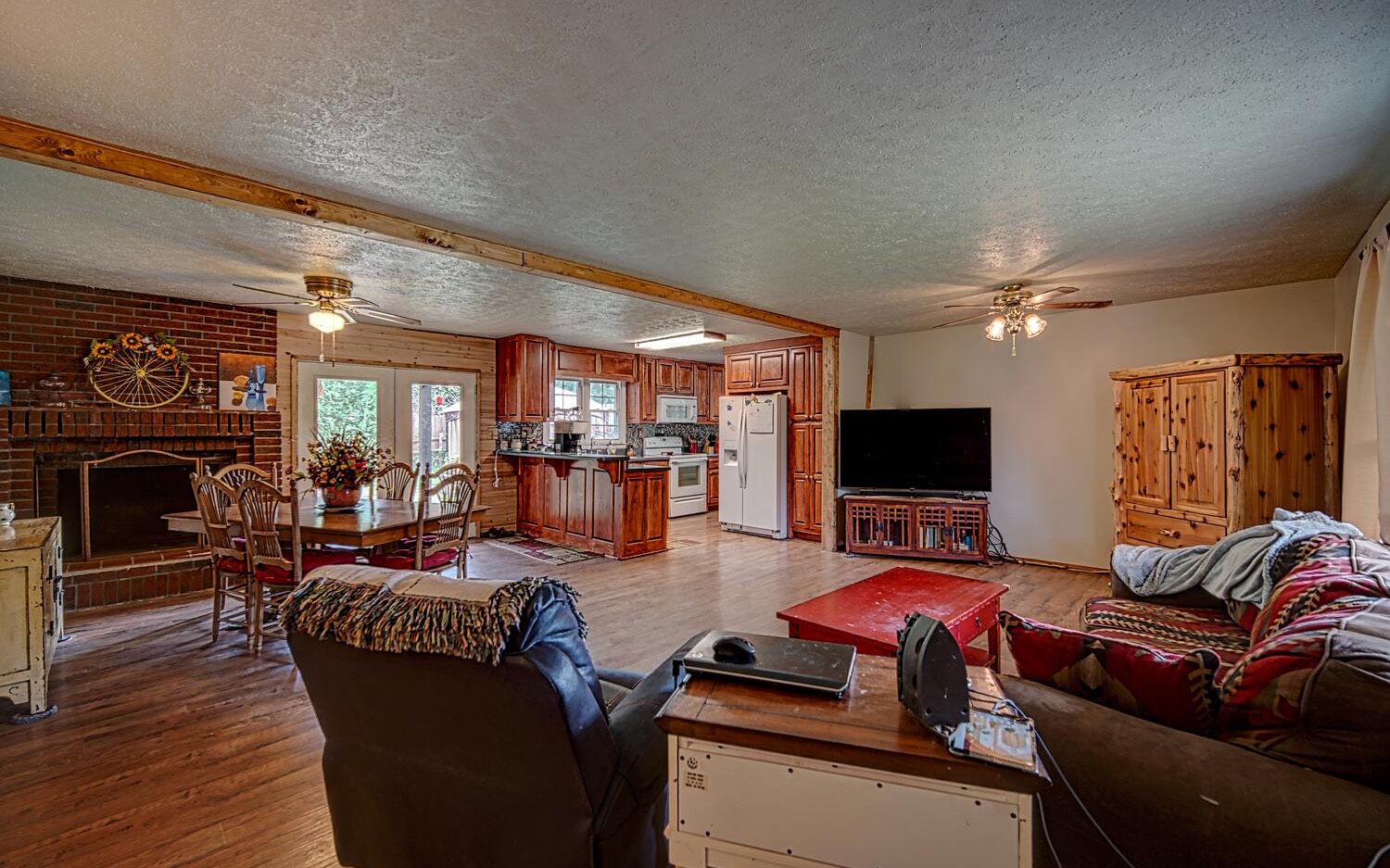 180 Madola Road Epworth, GA 30513 - Photo 2 of 4 a living room with furniture and a flat screen tv