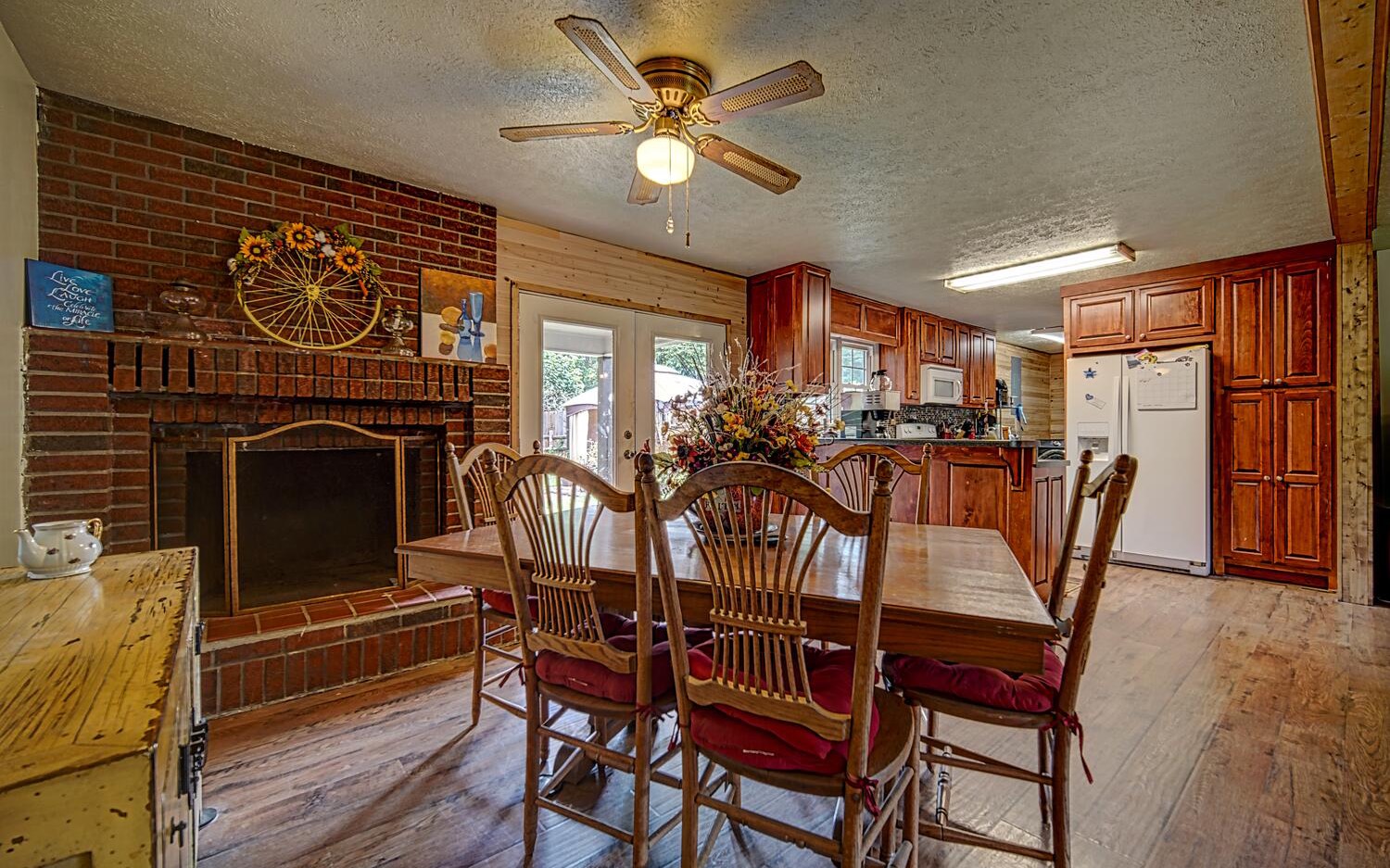 180 Madola Road Epworth, GA 30513 - Photo 3 of 4 a view of a dining room with furniture window and wooden floor