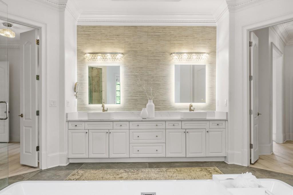 515 Tullamore Way Alpharetta, GA 30004 - Photo 19 of 71 a bathroom with a sink and a mirror