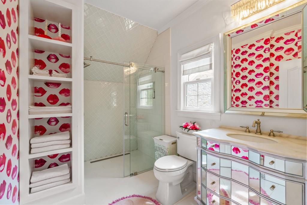 515 Tullamore Way Alpharetta, GA 30004 - Photo 28 of 71 a bathroom with a sink toilet vanity and shower curtain