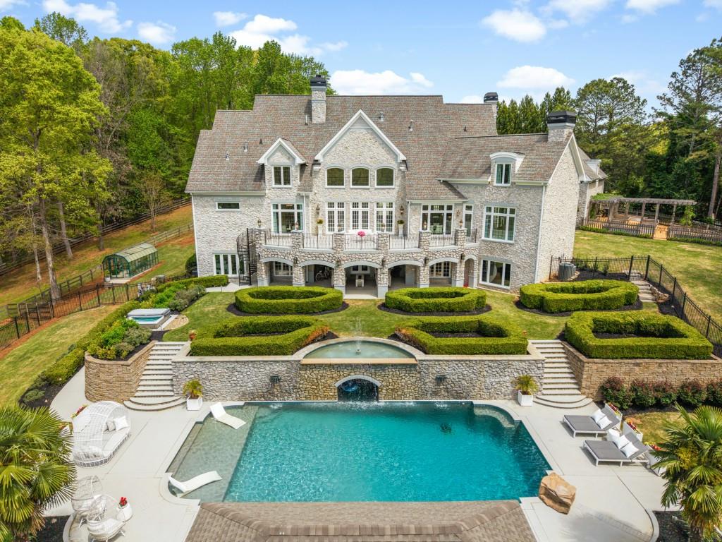 515 Tullamore Way Alpharetta, GA 30004 - Photo 3 of 71 an aerial view of a house with a garden and trees