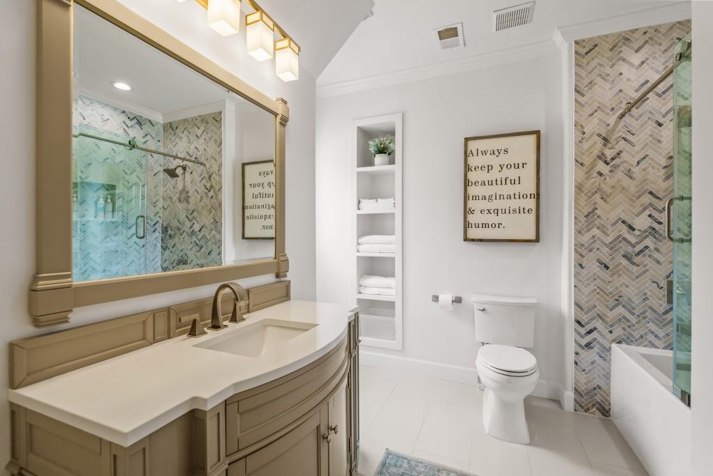 515 Tullamore Way Alpharetta, GA 30004 - Photo 31 of 71 a bathroom with a sink toilet vanity and shower