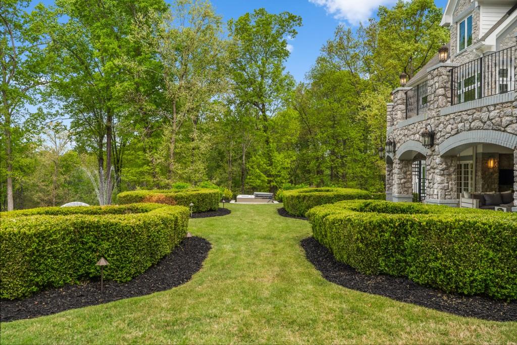 515 Tullamore Way Alpharetta, GA 30004 - Photo 45 of 71 a view of a garden with large tree