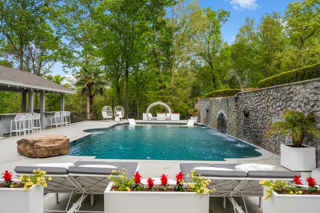 515 Tullamore Way Alpharetta, GA 30004 - Photo 50 of 71 a view of yard with swimming pool and furniture