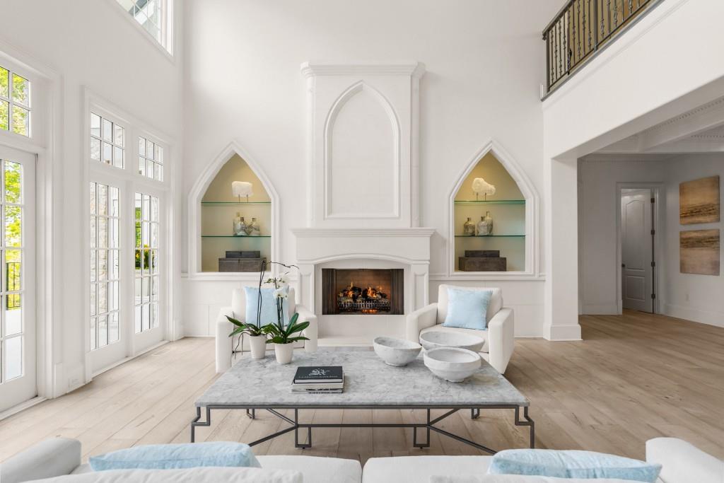 515 Tullamore Way Alpharetta, GA 30004 - Photo 5 of 71 a living room with furniture and a fireplace