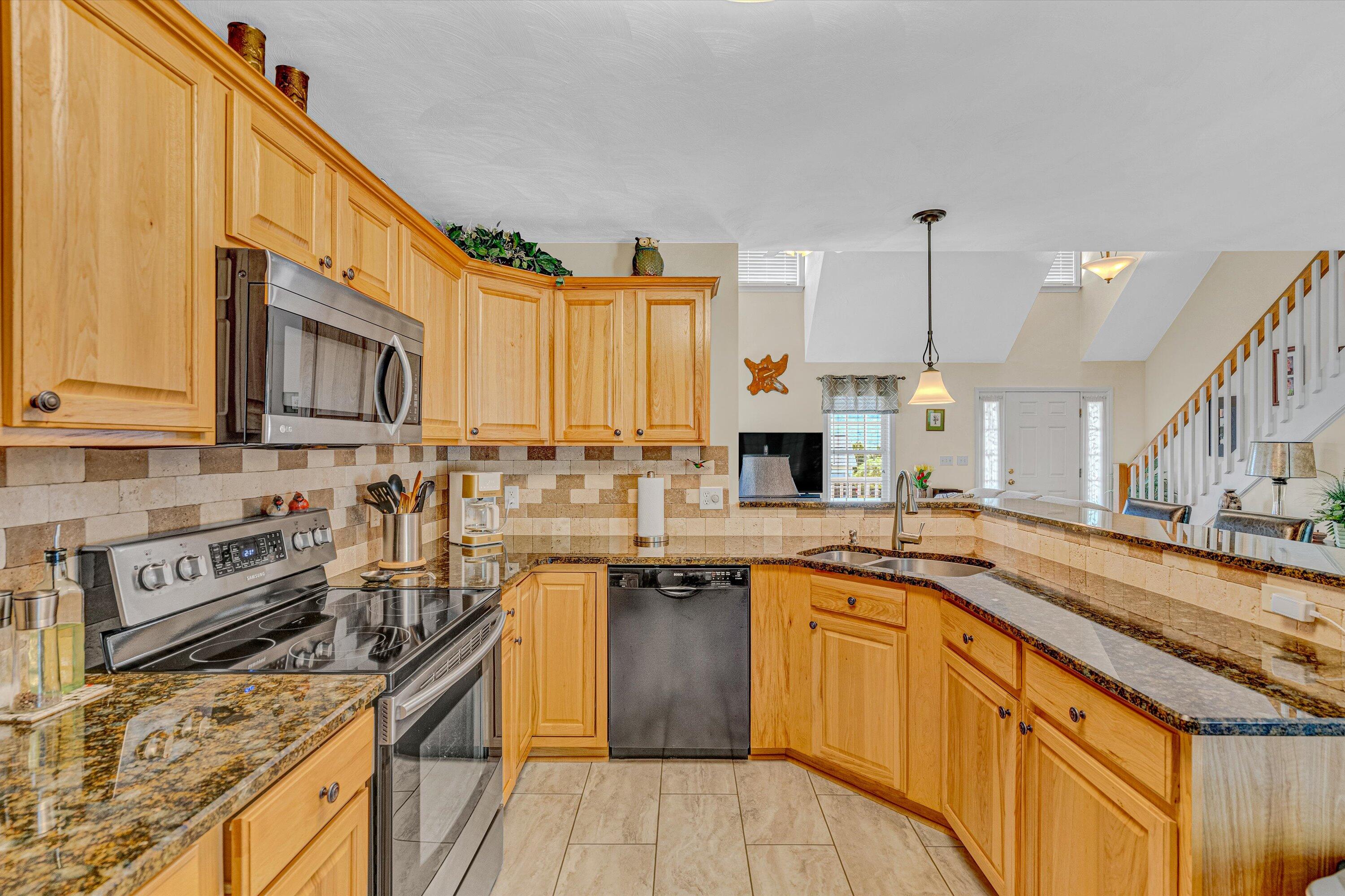 1304 Virginia Ridge Drive Hardy, VA 24101 - Photo 15 of 33 a kitchen with stainless steel appliances granite countertop a sink stove and cabinets