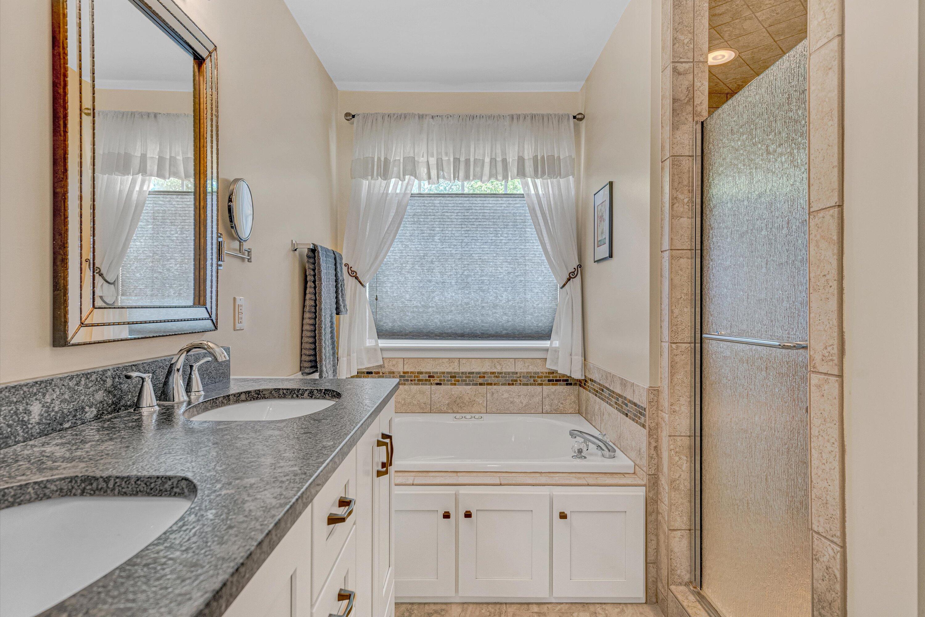 1304 Virginia Ridge Drive Hardy, VA 24101 - Photo 20 of 33 a bathroom with a granite countertop sink and a mirror