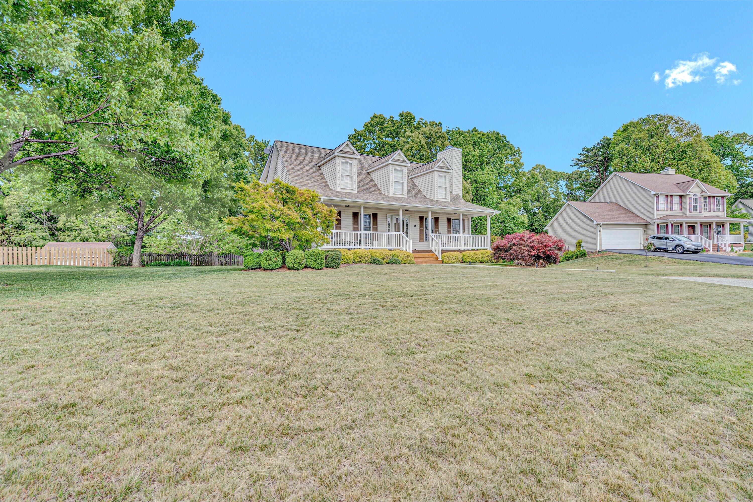 1304 Virginia Ridge Drive Hardy, VA 24101 - Photo 2 of 33 a view of a house with a yard