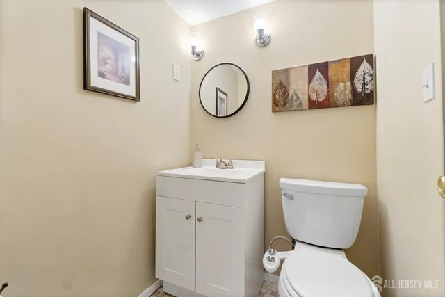 a bathroom with a toilet and a sink