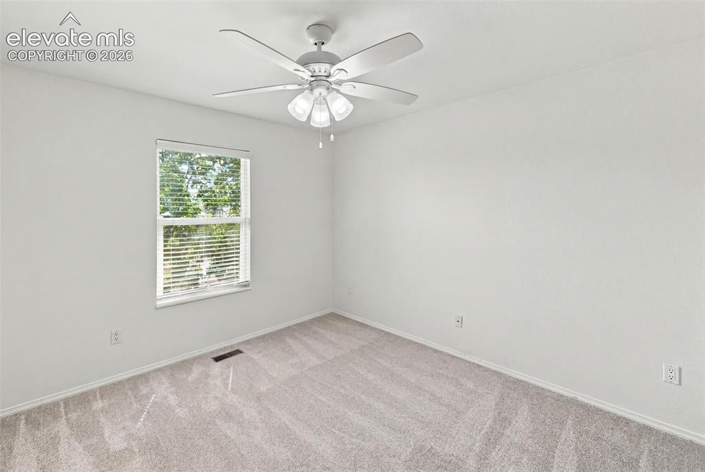 1239 Suncrest Way Colorado Springs, CO 80906 - Photo 32 of 46 Bedroom 2 - main level