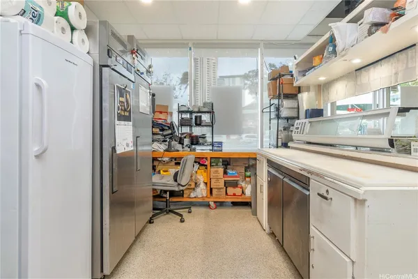 a view of a kitchen with utility and utility