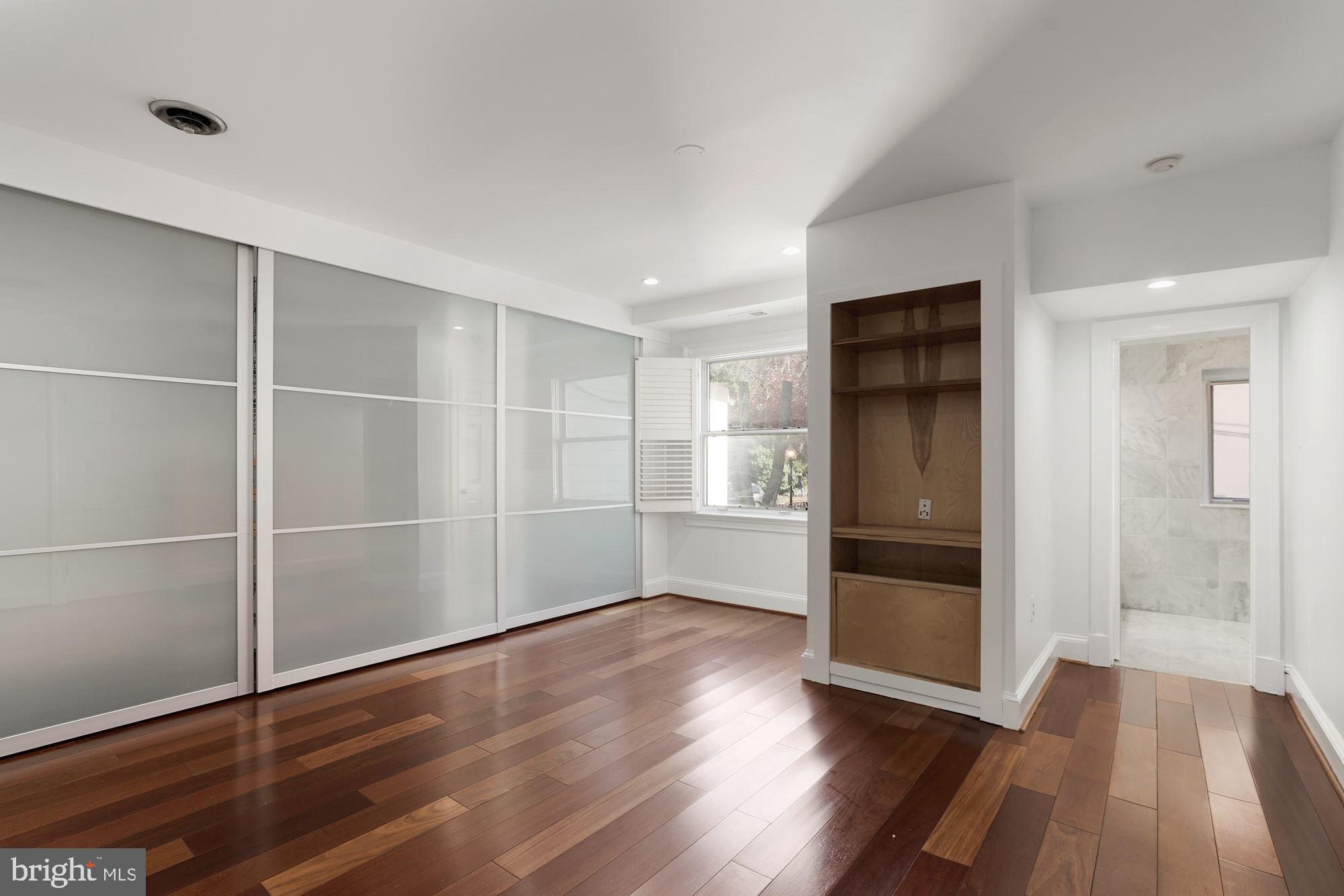 1675 Wisconsin Avenue Northwest Washington, DC 20007 - Photo 17 of 36 Owner's Bedroom