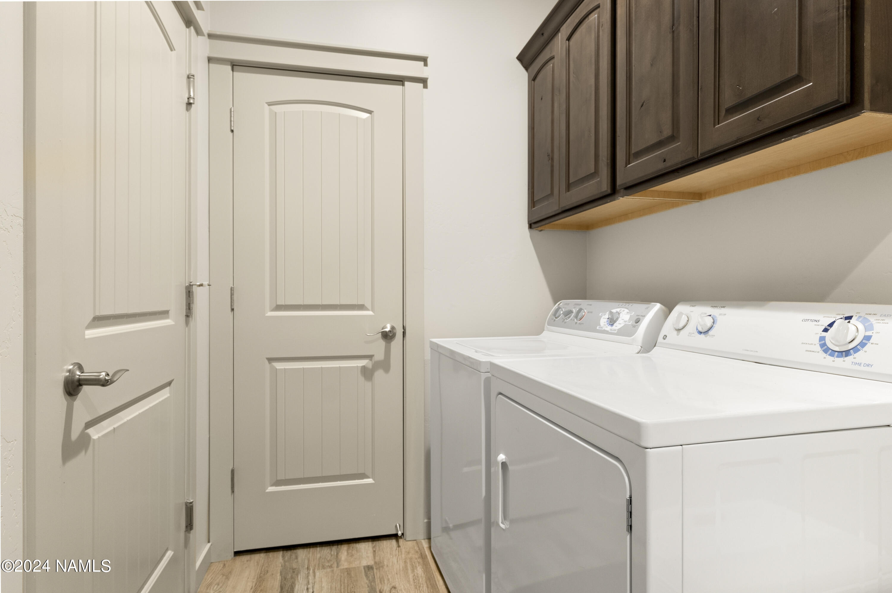 10290 Lundin Road Flagstaff, AZ 86004 - Photo 19 of 43 a utility room with dryer and washer