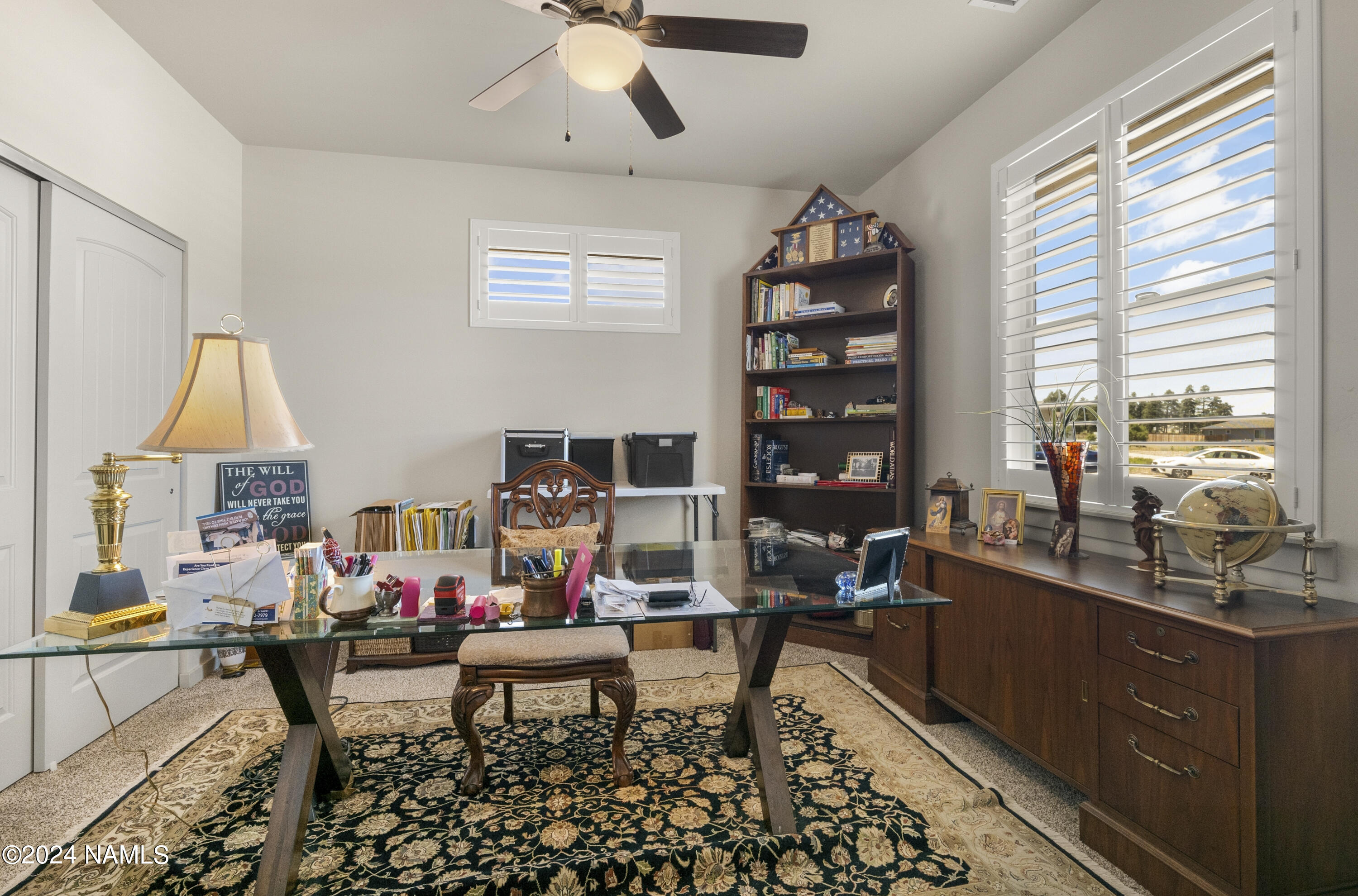10290 Lundin Road Flagstaff, AZ 86004 - Photo 29 of 43 a living room with furniture and a window