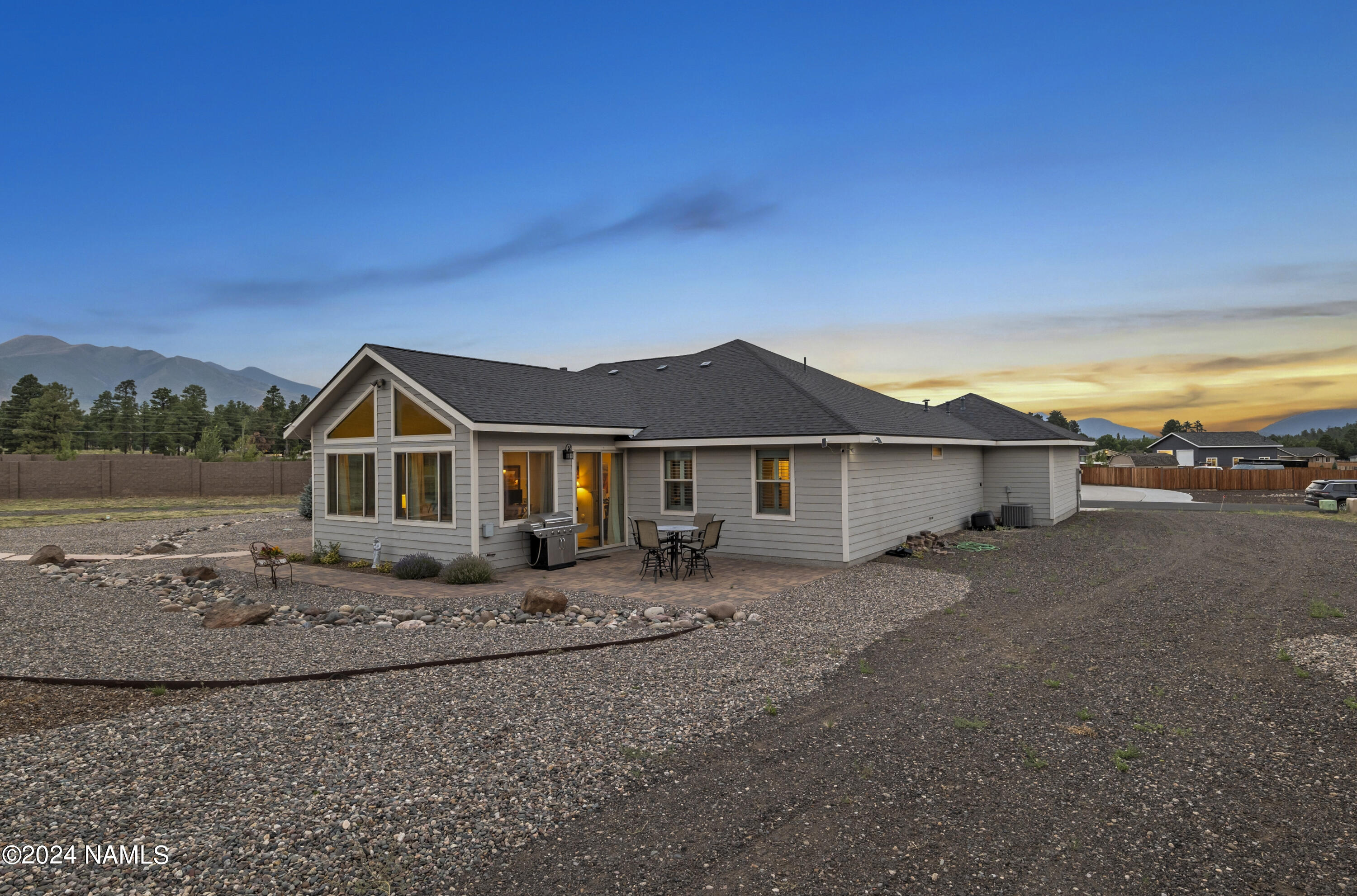 10290 Lundin Road Flagstaff, AZ 86004 - Photo 3 of 43 a front view of a house with a yard