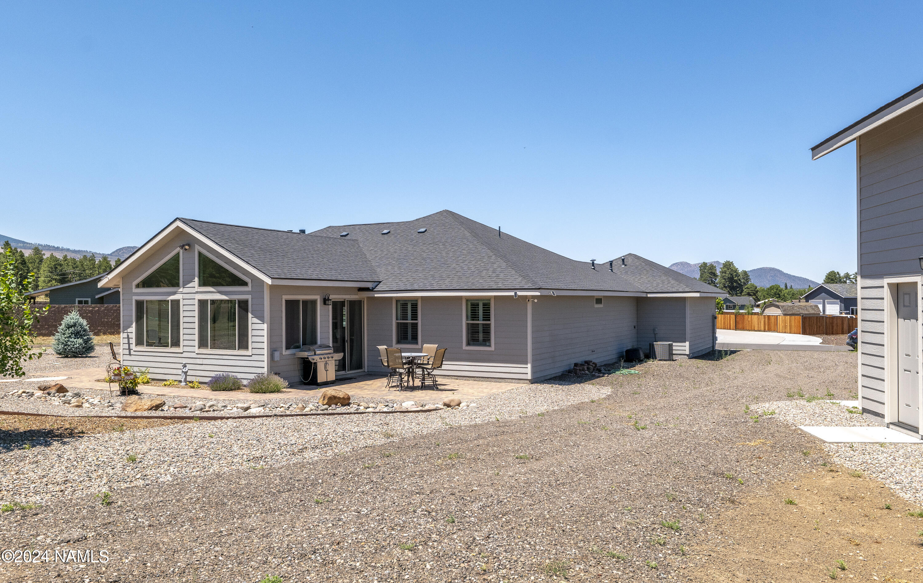 10290 Lundin Road Flagstaff, AZ 86004 - Photo 32 of 43 a front view of a house with a yard