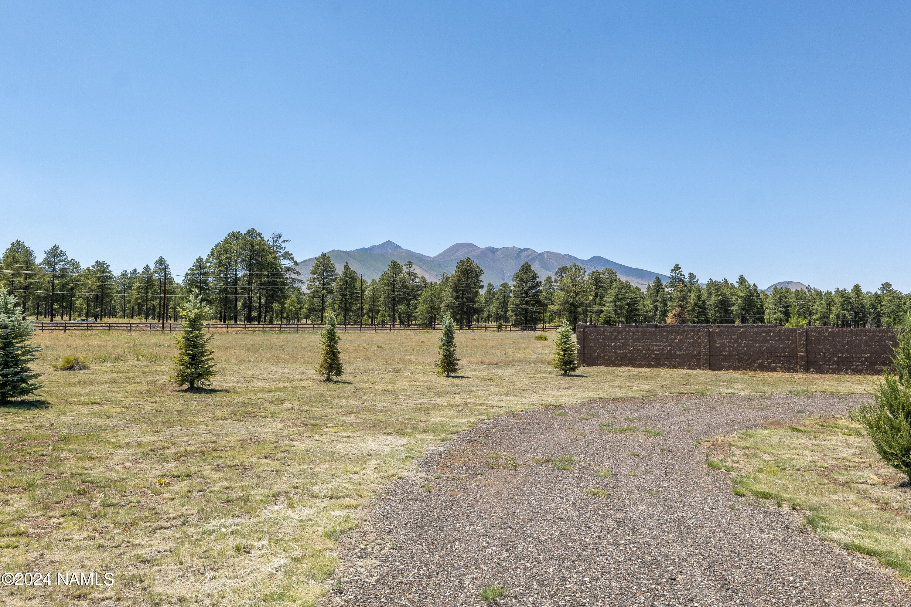 10290 Lundin Road Flagstaff, AZ 86004 - Photo 33 of 43 a view of a lake view with mountain in the background
