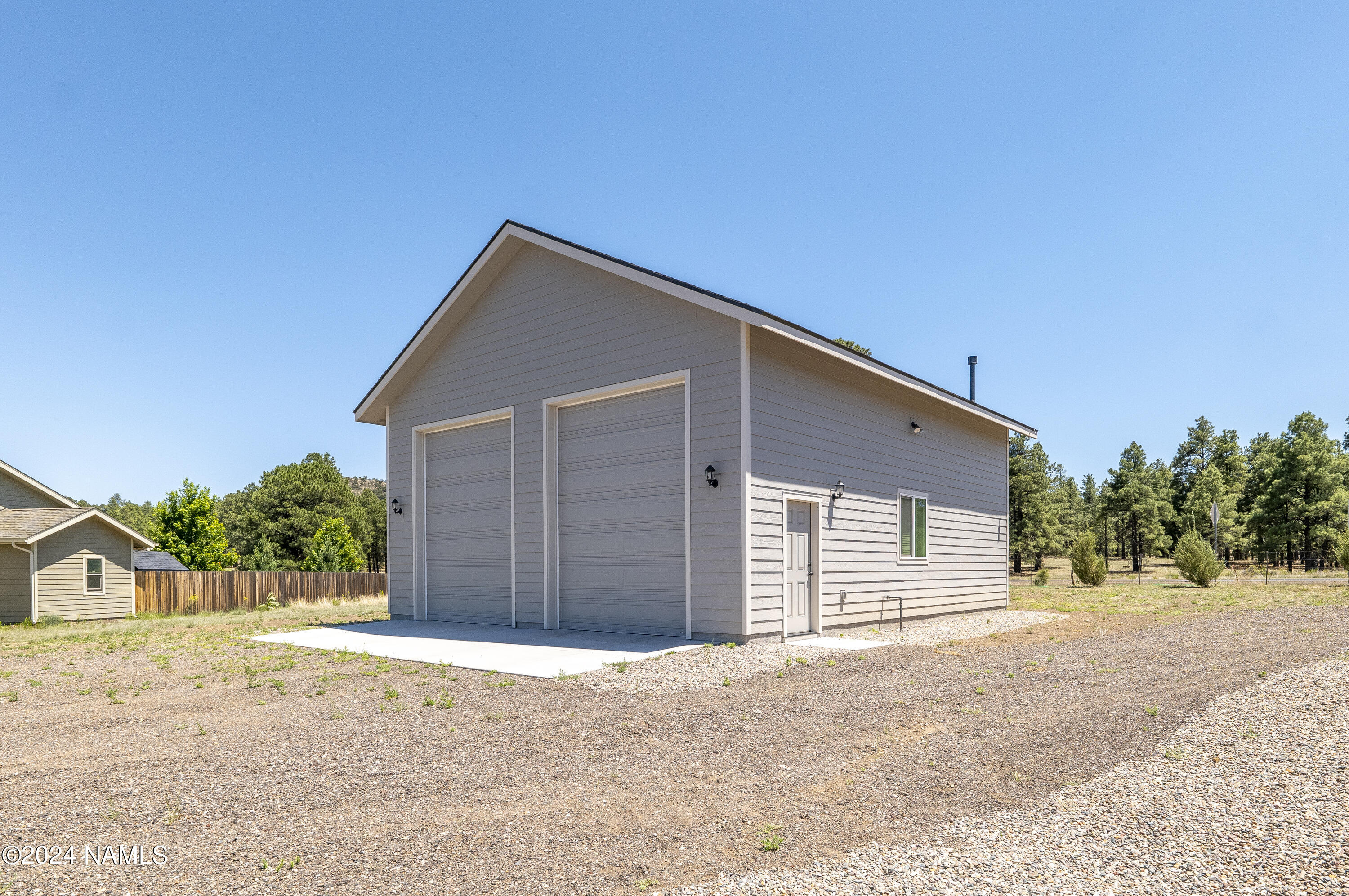 10290 Lundin Road Flagstaff, AZ 86004 - Photo 35 of 43 a house with a outdoor space