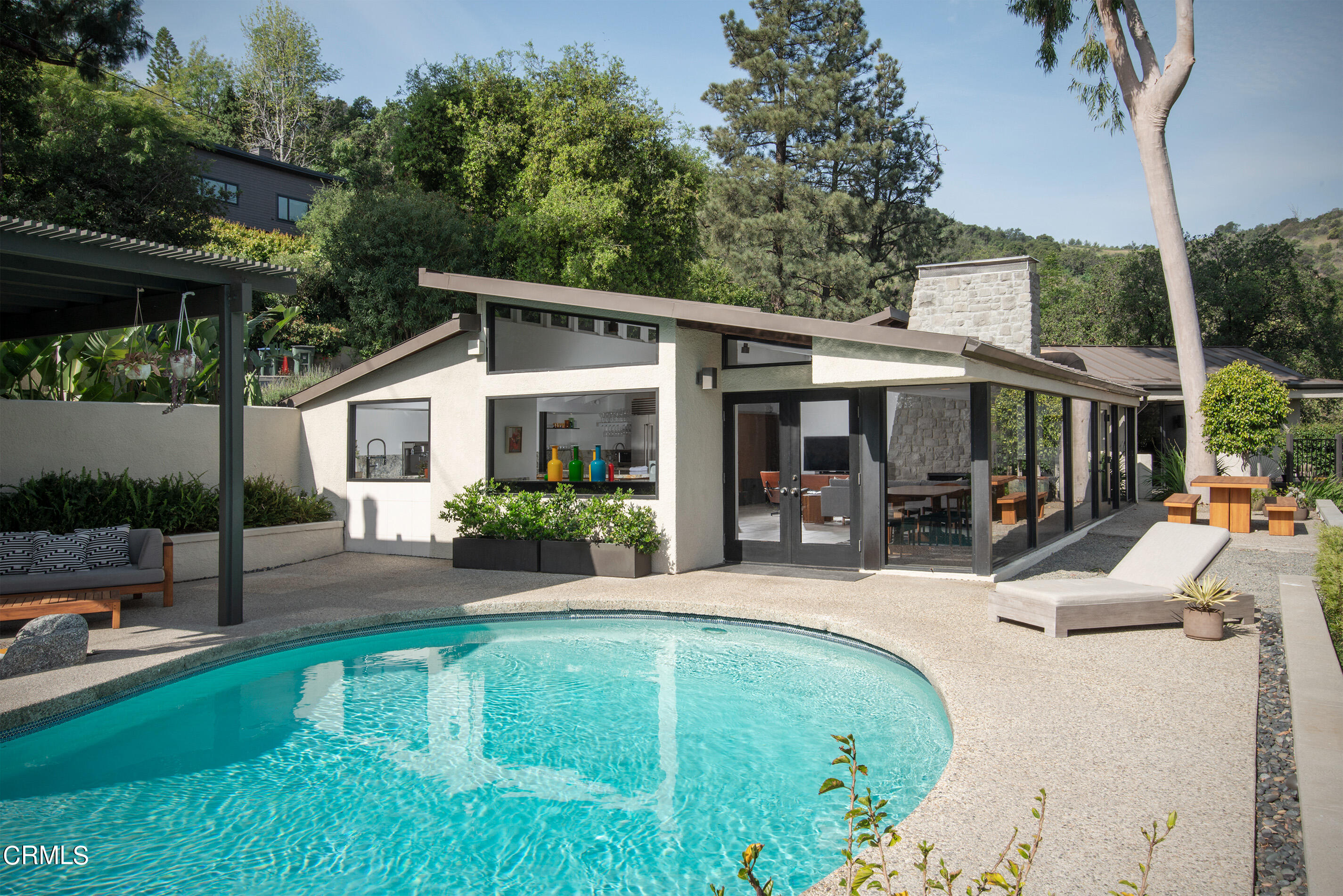 1255 Rancheros Road Pasadena, CA 91103 - Photo 2 of 10 a view of a house with backyard porch and sitting area